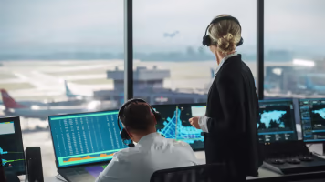 air-traffic-controllers-in-airport-tower-16x9