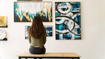 Woman admiring art in museum protected by Kidde inert gas fire protection system